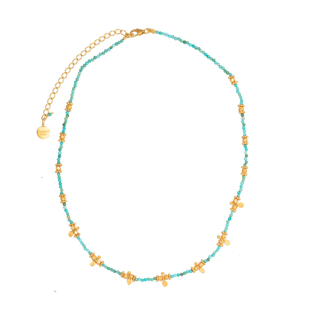 Rubyteva Short Turquoise beaded necklace with gold charm pendants